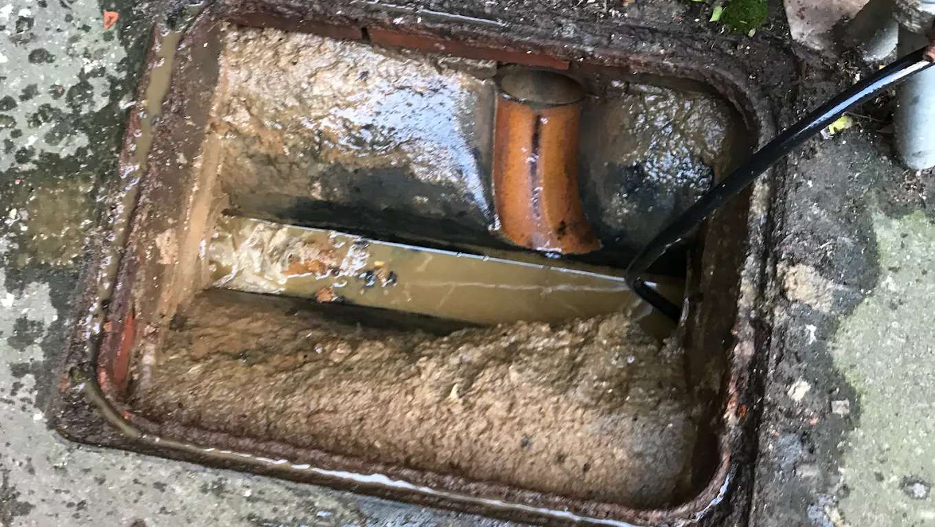 A picture of a blocked drain